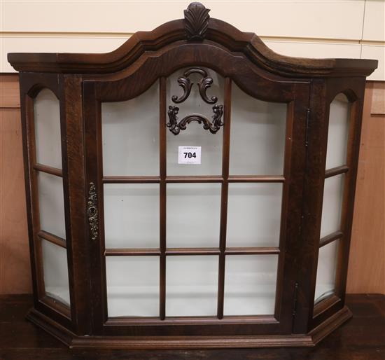A Dutch style walnut table top glazed display cabinet with canted sides, W 29in